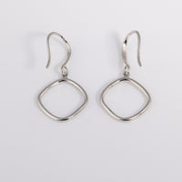 Simple Rhodium plated silver Hook Earrings that have a rounded edge, geometric shape. Tranish resistant and nickle free