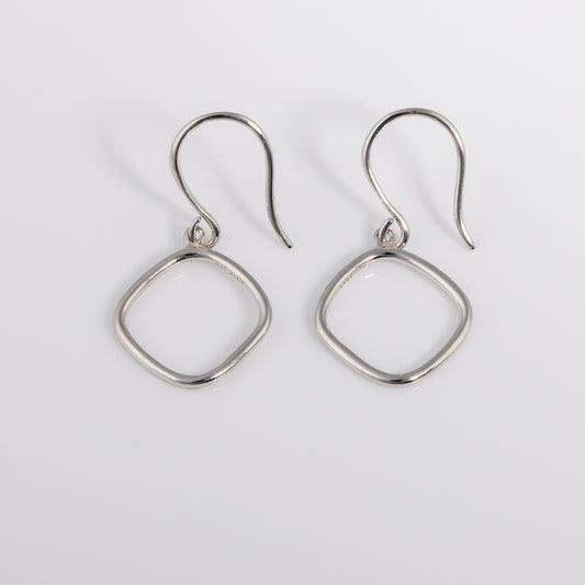 Simple rhodium plated silver Hook Earrings that have a rounded geometric shape.