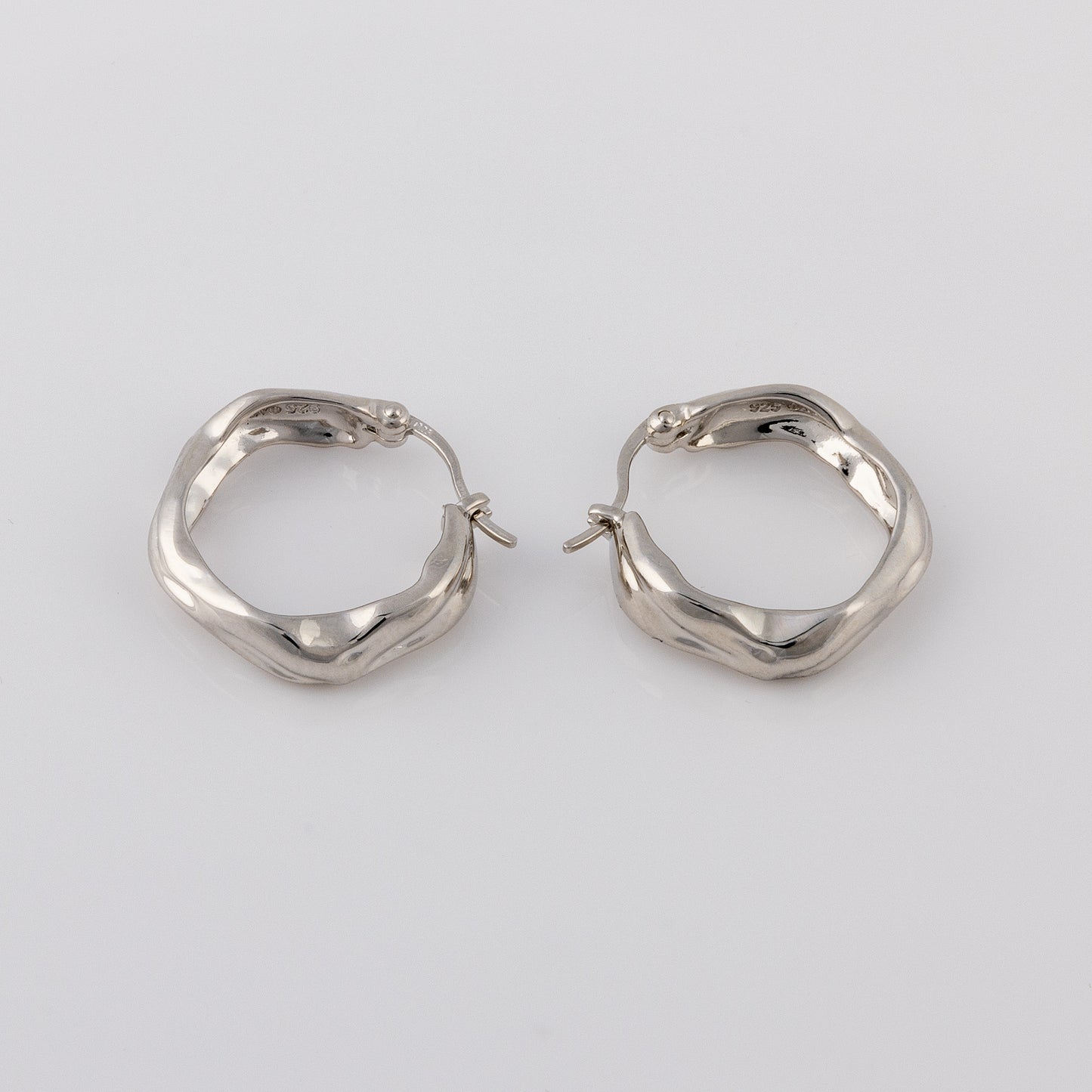 Huggie Hoop Silver Rhodium Earrings