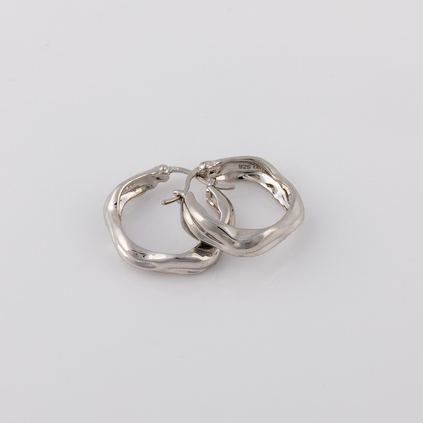 Huggie Hoop Silver Rhodium Earrings