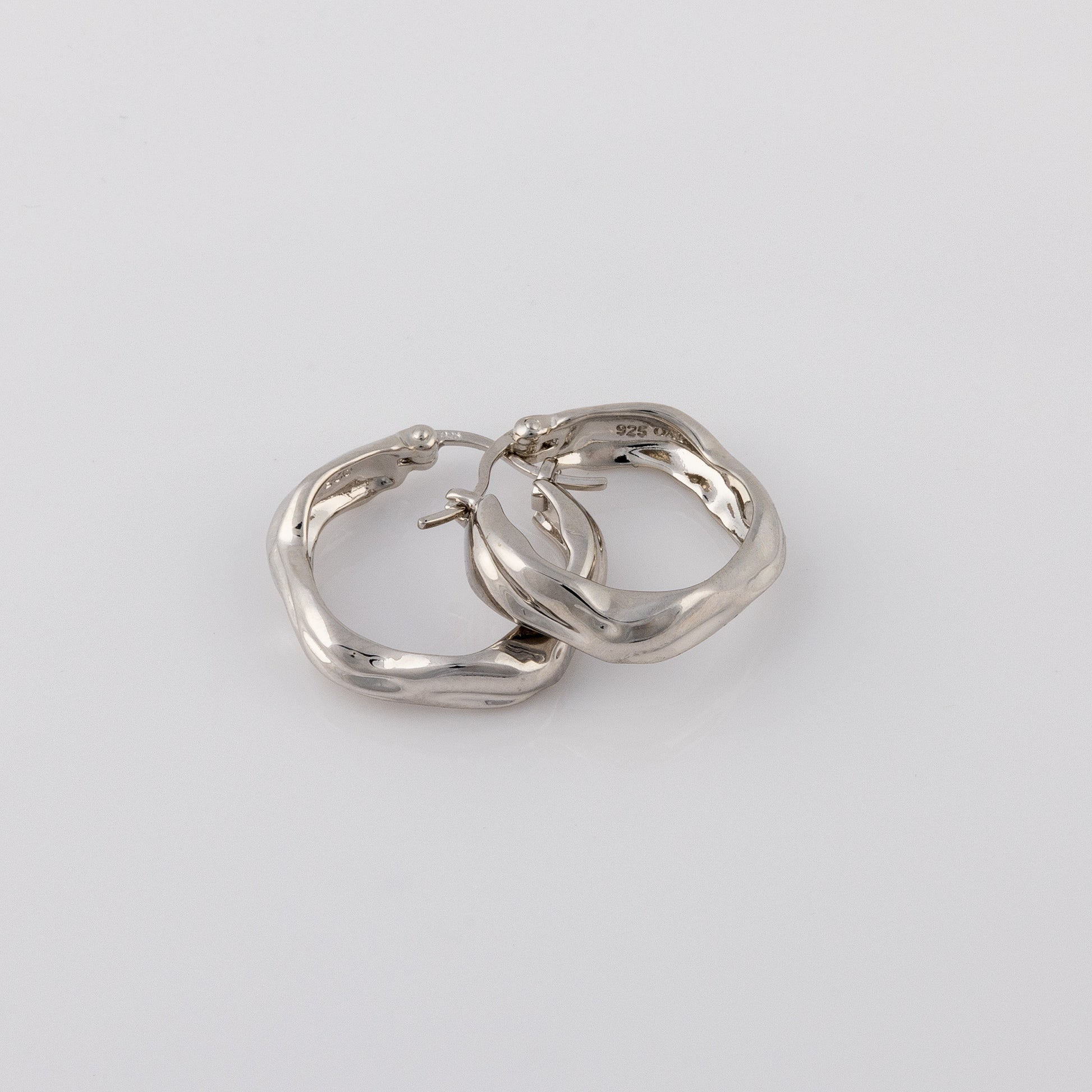 Huggie Hoop Silver Rhodium Earrings