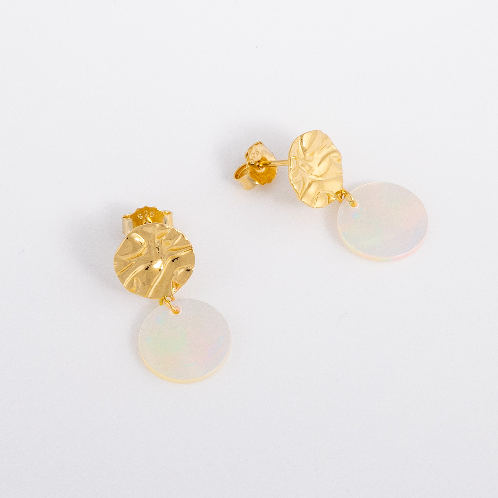 Molten textured Gold Vermeil Stud Earrings with a disc of Mother of Pearl Dangling.