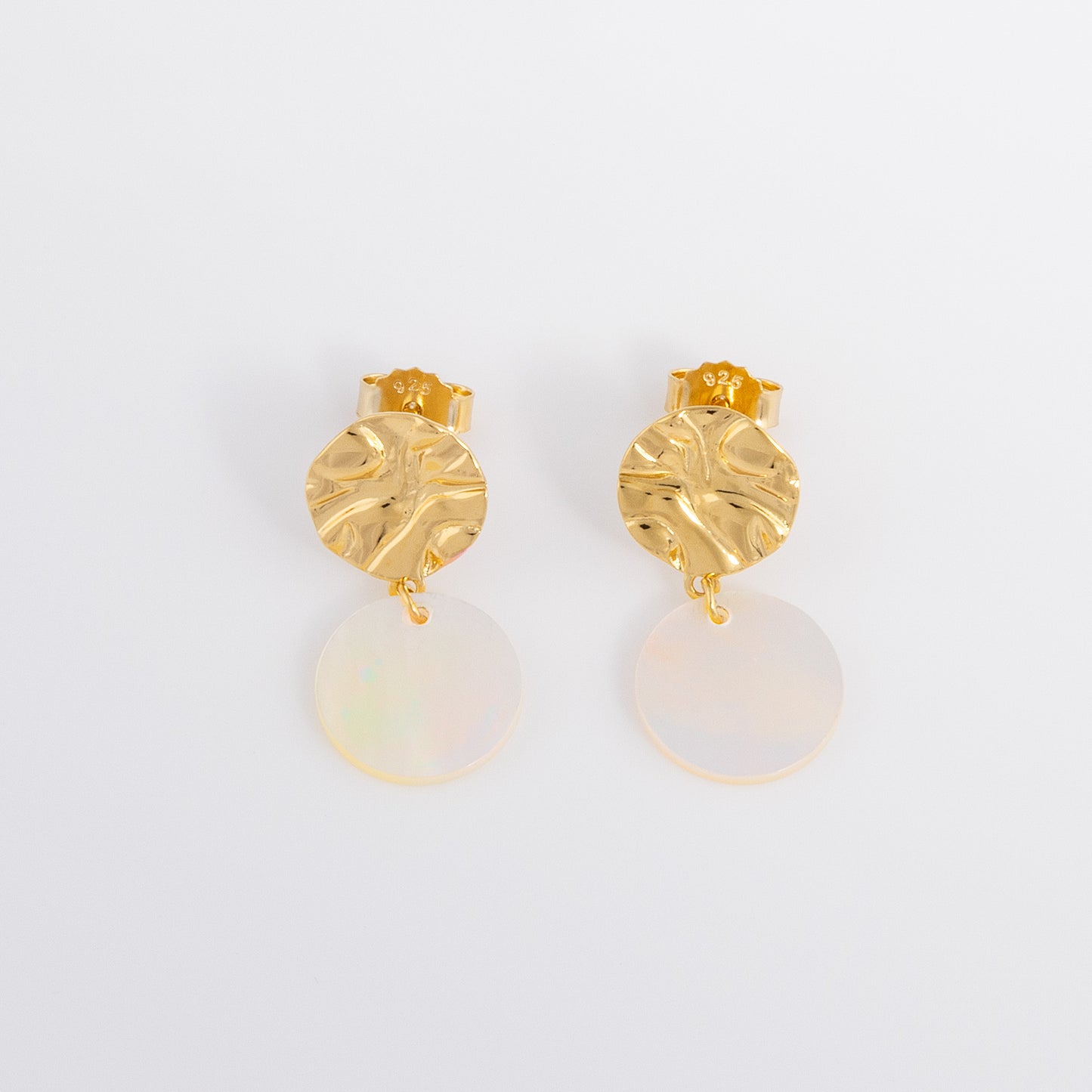 Stunning molten Textured Gold Vermeil Stud Earrings with Mother of Pearl Dangling. The earrings have a butterfly back and are hypoallergenic and tarnish resistant.