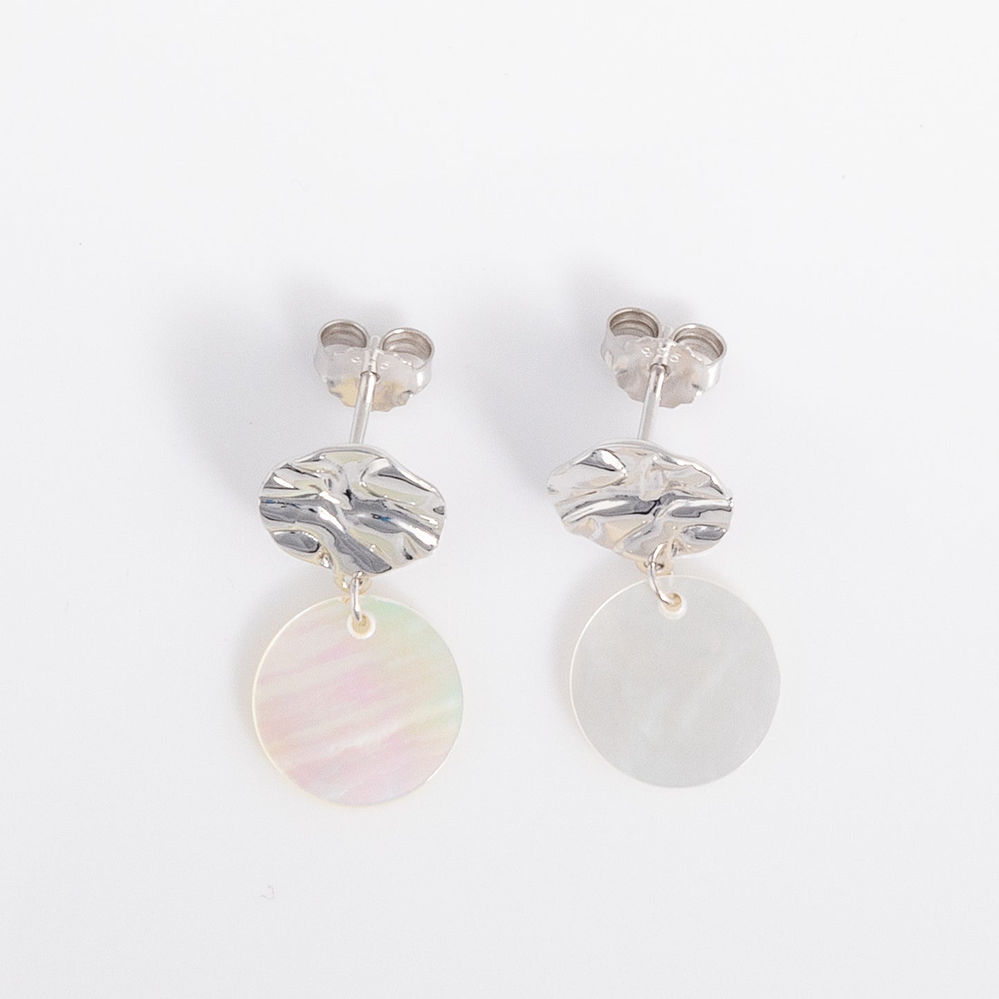 Textured Silver Rhodium Stud Earrings with Mother of Pearl Dangling. A stunning pair of studs with butterfly backs. Hypoallgenic, tarnish resistant and lightweight.