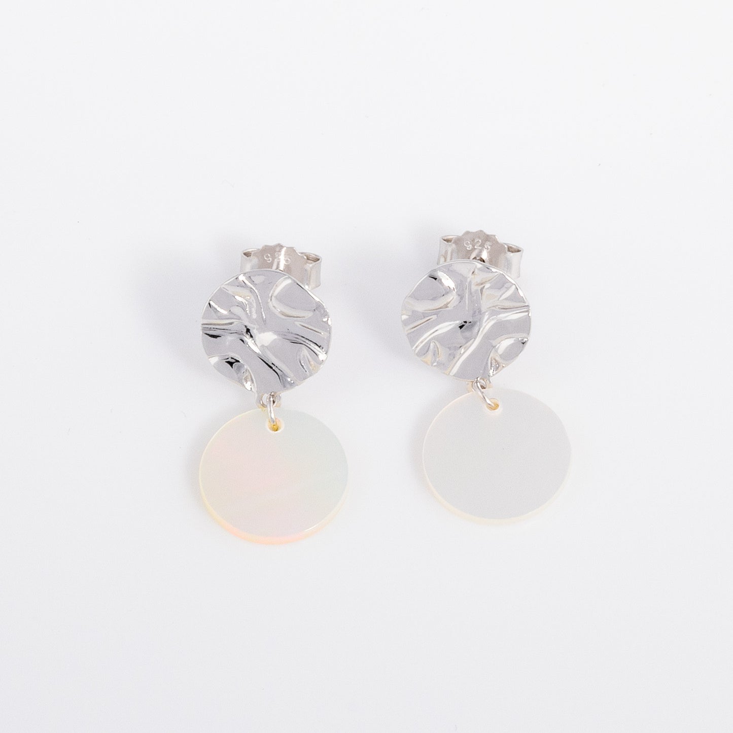 Textured Silver Rhodium Stud Earrings with Mother of Pearl Dangling. Butterfly back, stud earrings that are lightweight and hypoallergenic suitable for all skin types