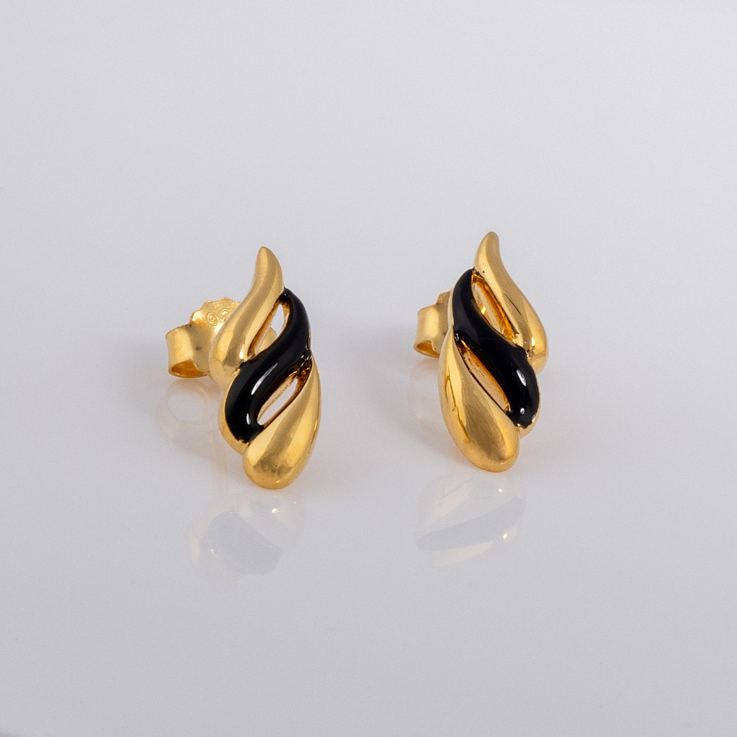 Gold Vermeil and Black Enamel Earrings with Wave Design. Butterfly back stud earrings that are suitable for sensitive skin.