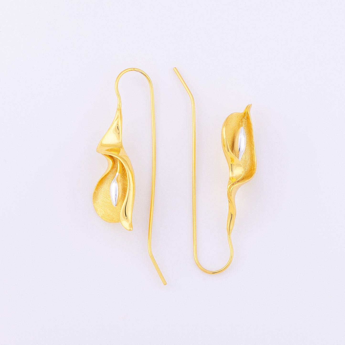 Large, gold vermeil, fishhook earrimgs. Statement earrings that are lightweight and comfortable. Tarnish free and hypoallergenic.
