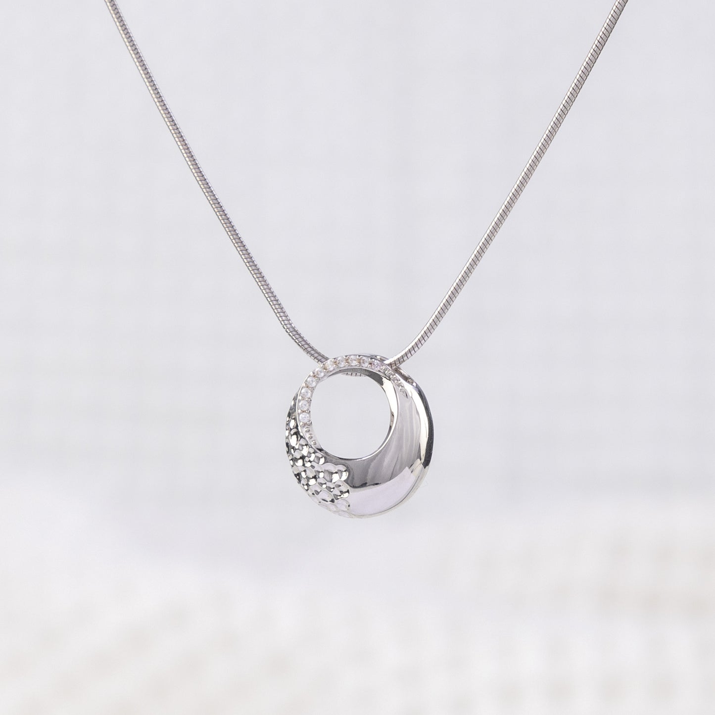 Silver Rhodium Circle Pendant Necklace with White Cubic Zirconia