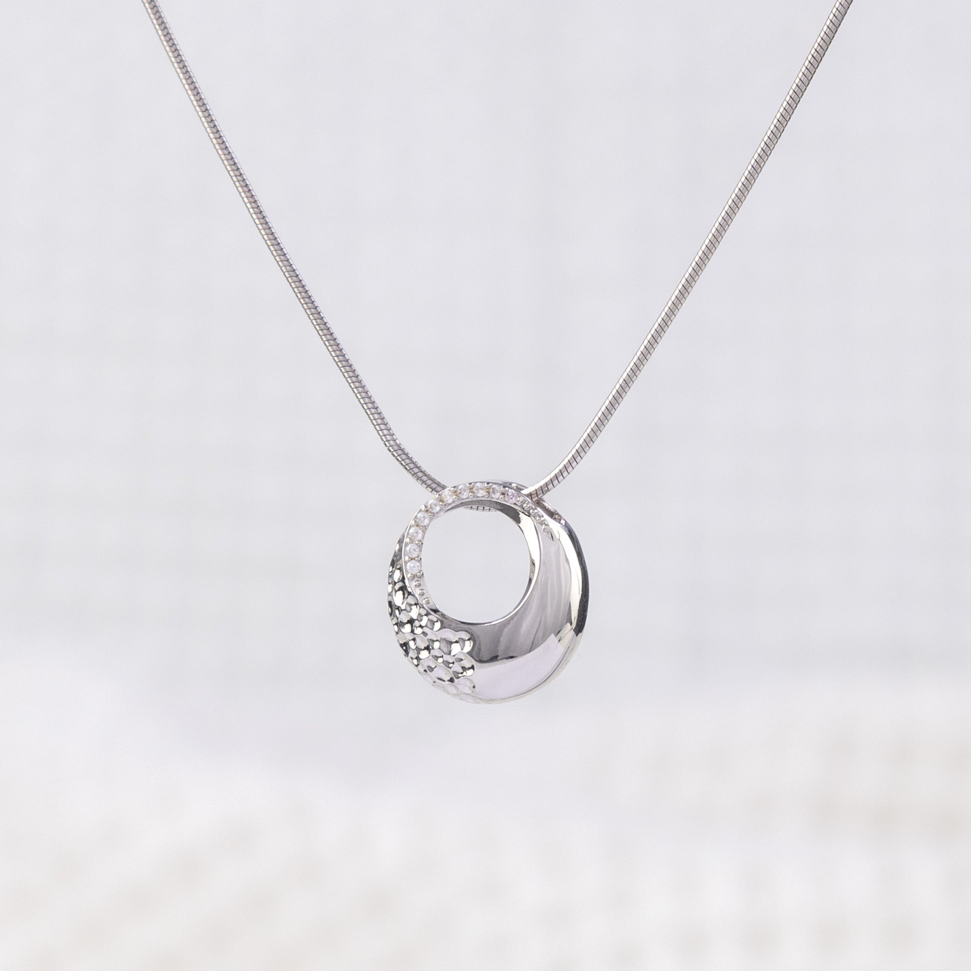 Silver Rhodium Circle Pendant Necklace with White Cubic Zirconia