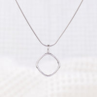 Simple Rhodium plated silver Pendant Necklace on a neat snake chain with lobster clasp.