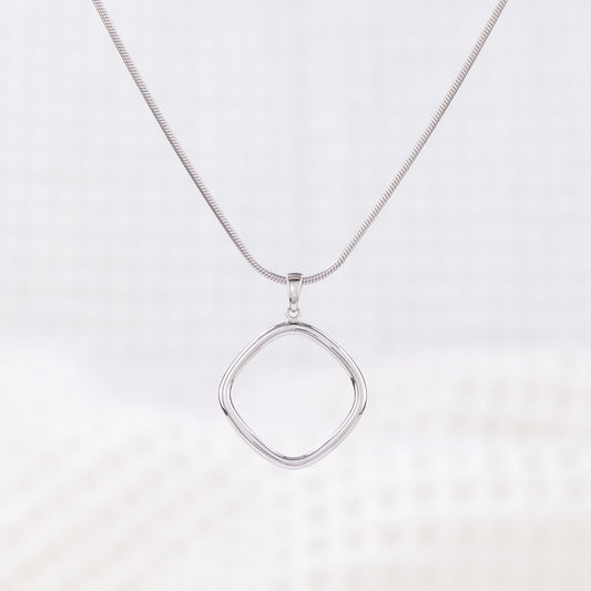Simple Rhodium plated silver Pendant Necklace on a neat snake chain with lobster clasp.