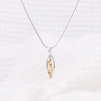 Silver Rhodium and Gold Vermeil Pendant Necklace with Two Intertwining Shapes