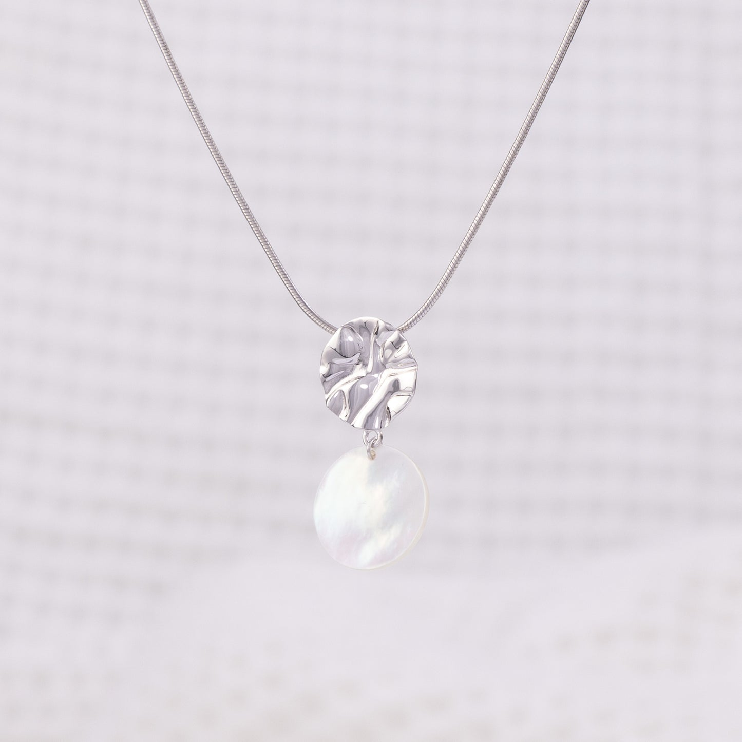 Textured Silver Rhodium Pendant Necklace with Mother of Pearl Dangling