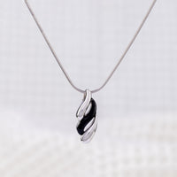 Silver Rhodium and Black Enamel Pendant Necklace with Wave Design