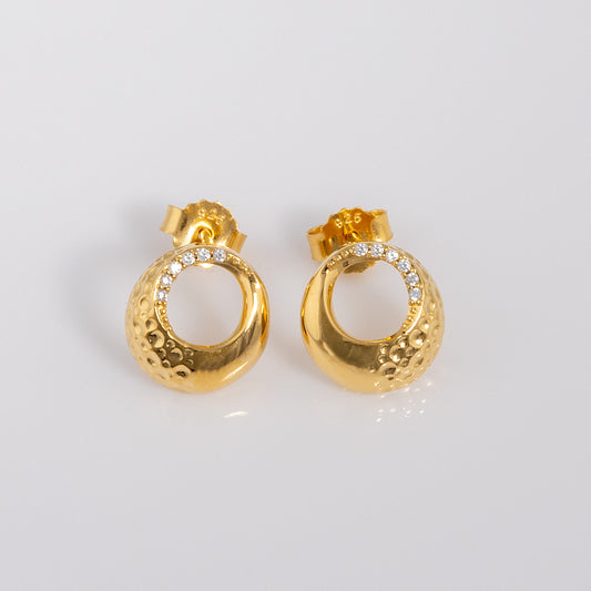 Gold Vermeil Circle Stud Earrings with White Cubic Zirconia. The studs have a butterfly clasp. The earrings have a textured finish.