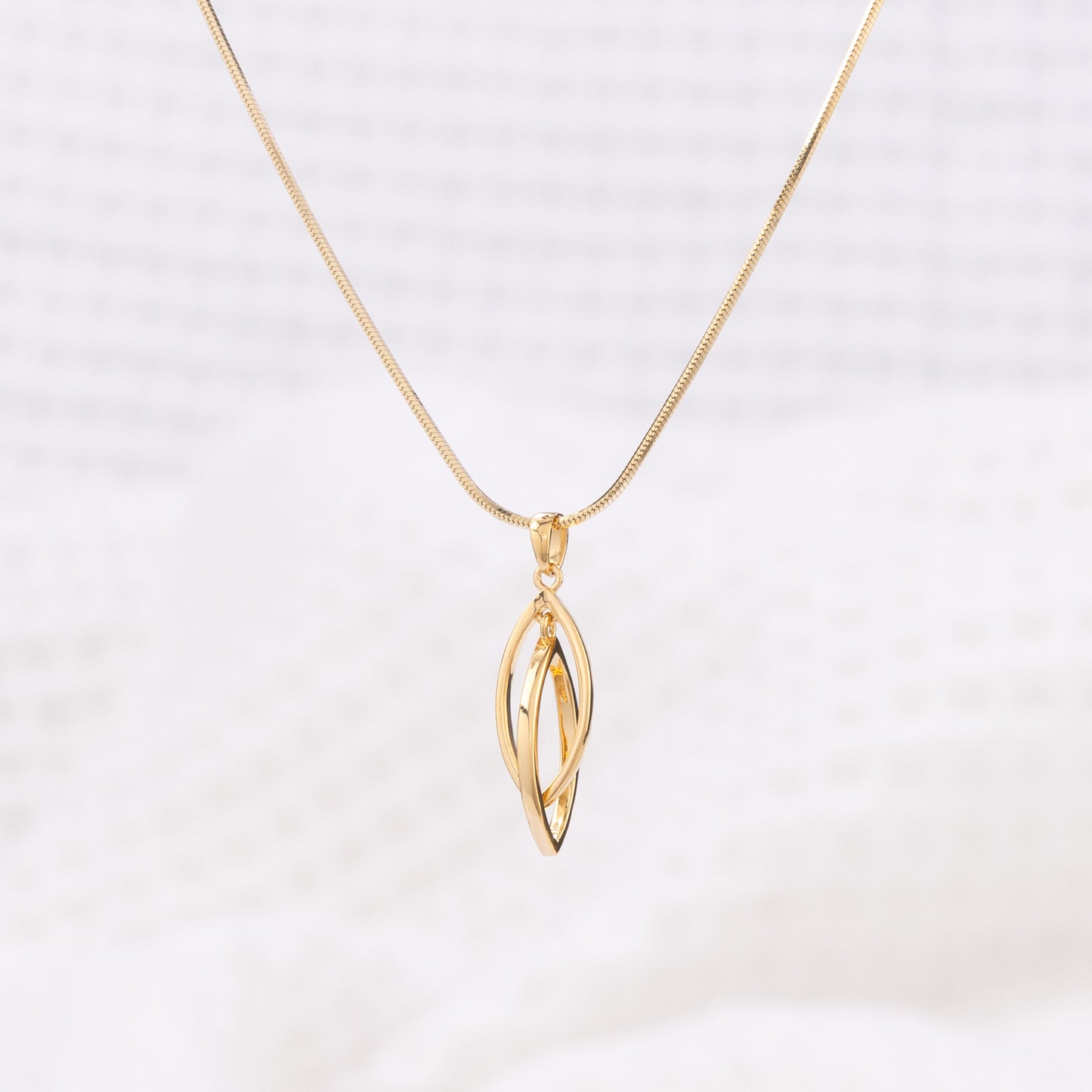 Gold Vermeil Pendant Necklace with Two Intertwining Shapes