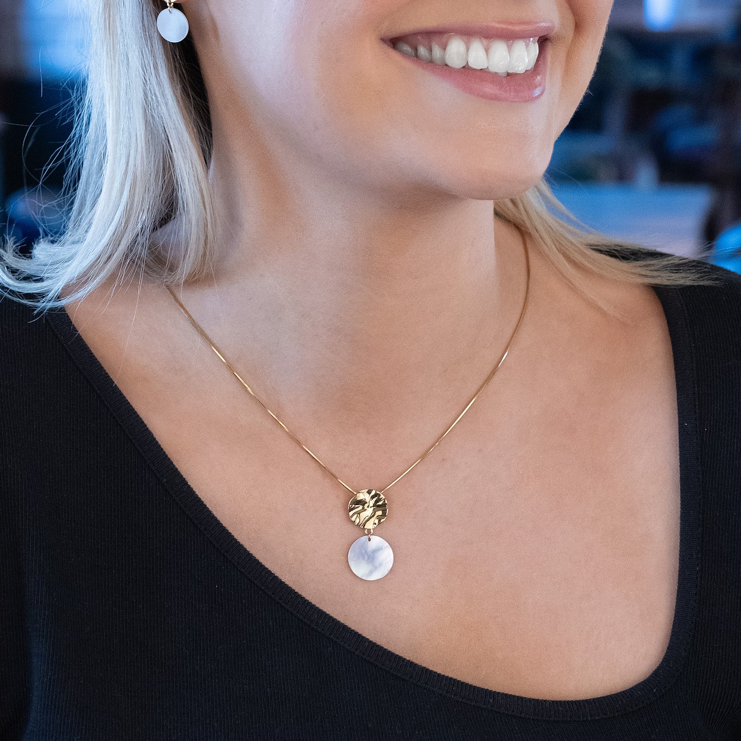 Molten Textured Gold Vermeil Pendant Necklace with a Mother of Pearl disc detail Dangling. The chain is a snake chain with a lobster clasp. 